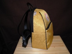 �������b�N